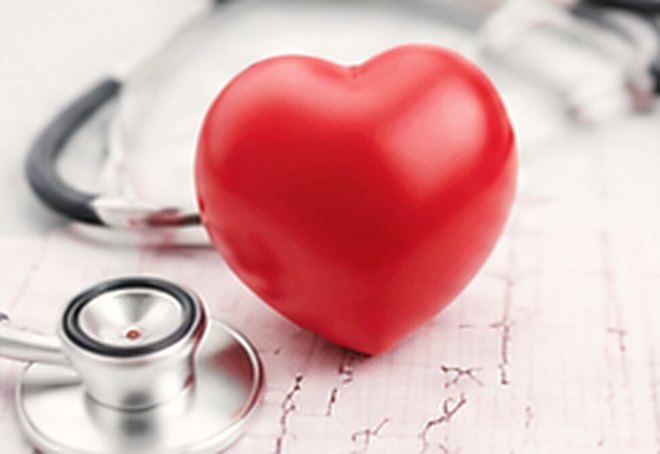 Stethoscope and ECG trace for a cardiac risk check